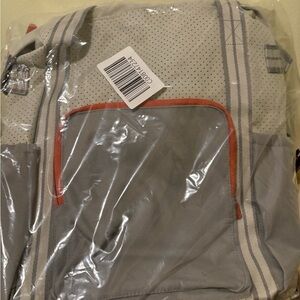 Gray and orange thirty one backpack